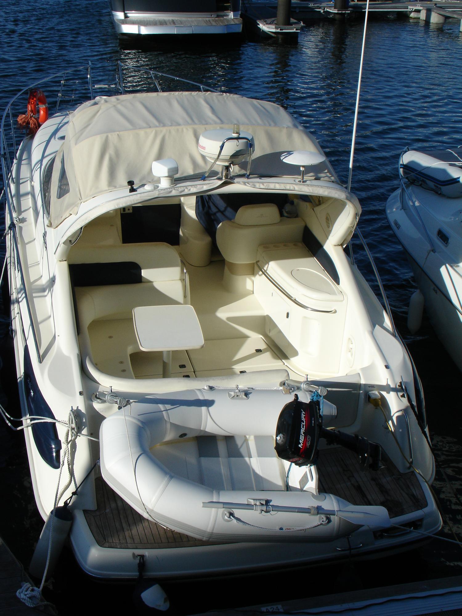 Motor yacht moored in a marina